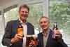 St Austell Brewery CEO James Staughton and Bath Ales founder Roger Jones toast the deal