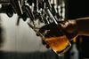 pint of beer pulling unsplash
