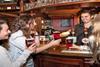 Ladies served pints of Greene King ale beer