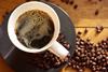 Coffee cup with coffee beans