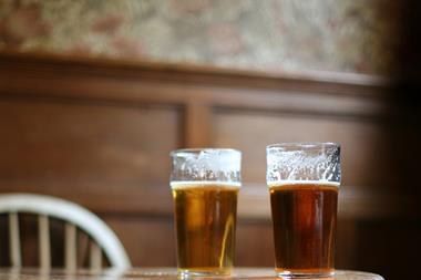 Pints of beer in pub GettyImages-sb10070088h-001