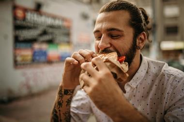 Man eating lunch outside