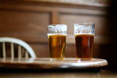 Pints of beer in pub GettyImages-sb10070088h-001