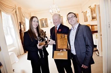 Lessee and Manager of The Andover Arms, Tom Gavaghan and Victoria de Polo, receive The Griffin Trophy for Fuller’s Pub of the Year from Fuller’s Chairman, Michael Turner.