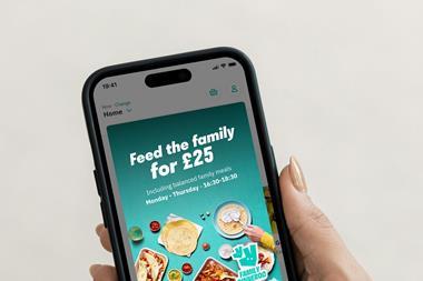 Free iPhone 14 Pro in Hand Mockup