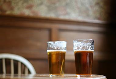 Pints of beer in pub GettyImages-sb10070088h-001