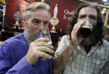 men drinking beer ale camra