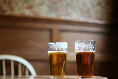 Pints of beer in pub GettyImages-sb10070088h-001