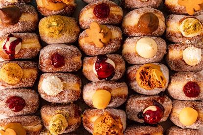 Close up of Bread Ahead doughnuts with a variety of toppings