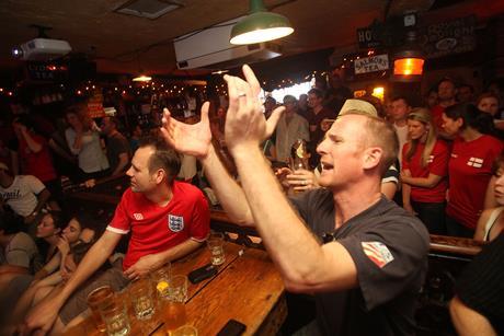 Football fans watch England World Cup match