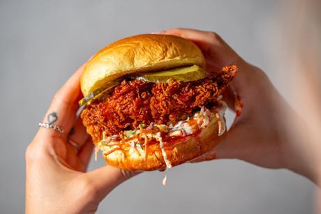 Hot-honey-chicken-burger-in-hand
