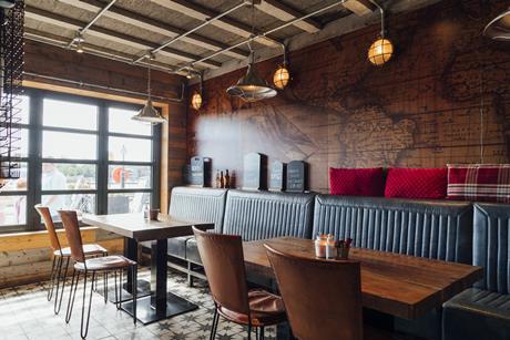 Empty restaurant tables GettyImages-1271897466